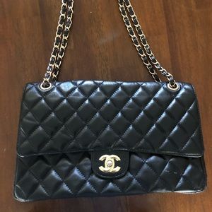 Black Luxury style design handbag with chains.